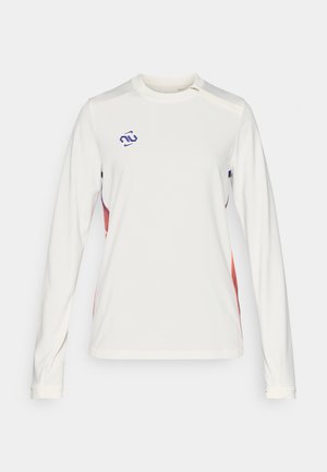 Maglia sportiva a maniche lunghe in tessuto bianco con logo viola. Presenta dettagli rossi sui lati e una zip all'altezza del collo.