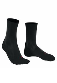 Calze nere realizzate in un materiale liscio ed elastico. Presentano un bordo a costine e un piccolo logo rosso vicino all'area delle dita.