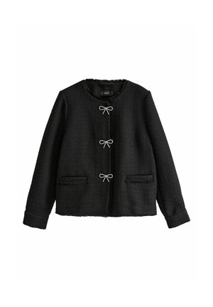 Veste noire texturée à manches longues avec col rond, trois fermoirs en forme de nœud argentés et deux poches avant.