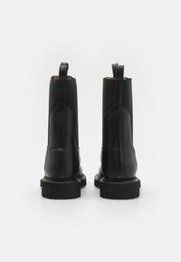 AllSaints HALLIE - Botines con plataforma - black