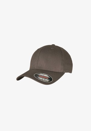 Brown baseball cap made of cotton blend fabric, featuring a curved brim, six-panel design, and a Flexfit sizing label on the front.