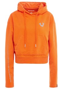 Hoodie orange court en tissu doux, doté d'une poche kangourou, de cordons de serrage et d'un logo gris clair sur la poitrine et la manche.
