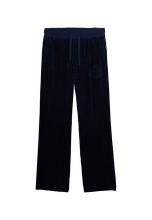 Pantalones de velour azul marino con cordón, bolsillos laterales y un sutil logo bordado en la parte superior del muslo izquierdo.