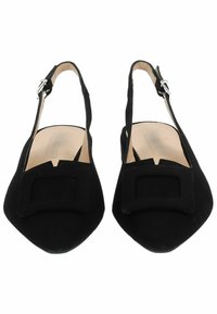 Black suede slingback shoes with a pointed toe, wide square buckle detail, and a slender ankle strap. Flat heel for comfort.