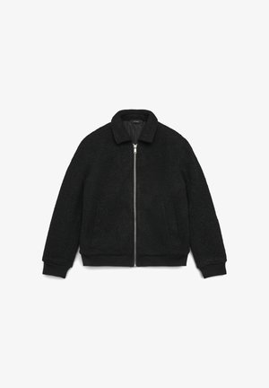 Schwarze Fleecejacke mit Reißverschluss, gerippten Bündchen und Saum sowie einem Kragen. Strukturierter Stoff sorgt für Wärme und Komfort. Keine sichtbaren Logos.