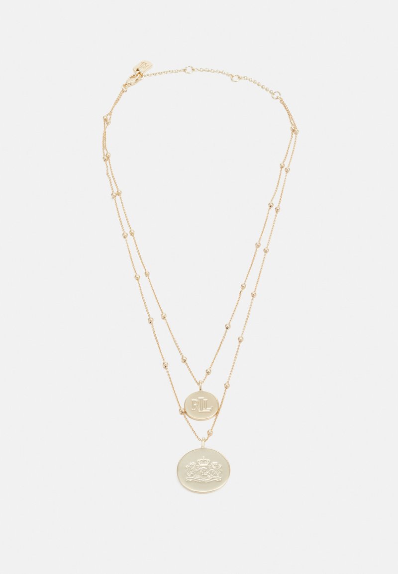 Gold-tone necklace with two layers; features a round coin pendant with a crown design and a medallion with embossed letters.