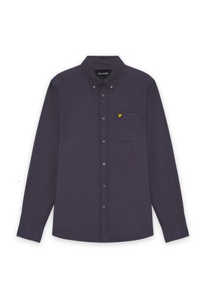 Marinblå långärmad skjorta med knäppbar krage, bröstficka och broderad gul logotyp. Har blåa knappar och en slät tygstruktur.