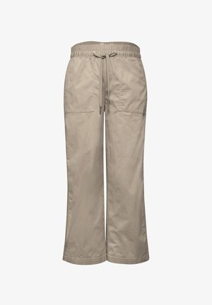 Beżowe spodnie o szerokich nogawkach z elastycznym paskiem, ściągaczem i przednimi naszywanymi kieszeniami, prezentowane na białym tle.