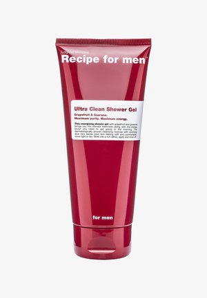 Rote Tube mit "Ultra Clean Duschgel" und einem weißen Etikett. Enthält Grapefruit und Guarana, speziell für die Männerpflege entwickelt. Glatte, glänzende Textur.