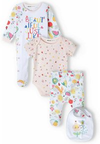 Set includes a white onesie with colorful text, a pink bodysuit, patterned pants, and a bib featuring whimsical fruit and animal designs.