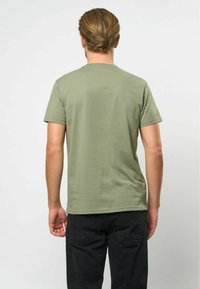 U.S. Polo Assn. ARJUN - Pamata T-krekls - sea spray