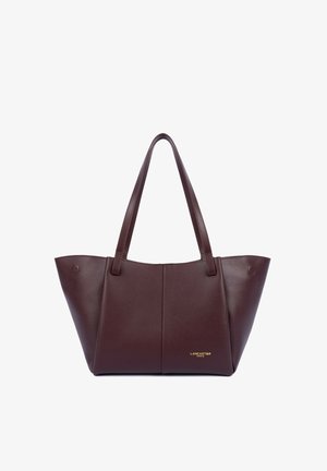 Borsa a mano in pelle marrone scuro con due manici e piccolo logo dorato "Lancaster Paris" nella parte anteriore in basso a destra.