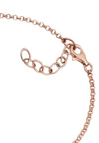 Rose gold metal kæde med ovale led, udstyret med en lobster clasp og forlængerkæde for justerbar længde. Tekstureret finish øger det visuelle interesse.