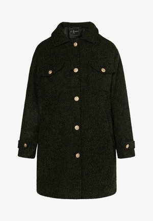 Tume rohelise tekstuuriga mantel, millel on krae, ees nööbid, kaks rinna taskut ja nööbiga varrukaotsad. Kuldsed nööbid lisavad detaili.