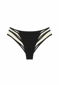 Zwarte zwemshort met contrasterende crème- en zwarte strepen. Zachte stof, mediumhoog ontwerp en schone randen zonder zichtbare hardware.
