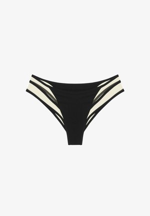 Bas de maillot de bain noir avec des rayures contrastantes crème et noires. Tissu doux, design taille intermédiaire et bords propres sans matériel visible.
