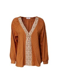 Blusa color ruggine con scollo a V, tessuto texturizzato, maniche a sbuffo e ricamo bianco decorativo lungo il centro e attorno allo scollo.