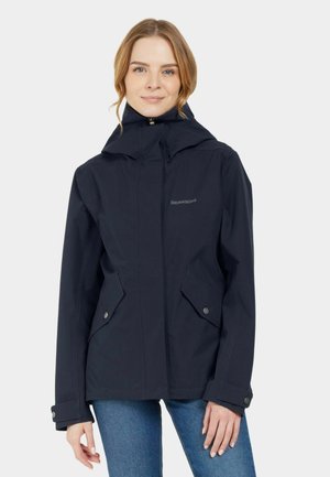 Navy waterproof jacket with a hood, featuring front zip closure, two angled pockets, and button accents on the sleeves. Smooth texture.