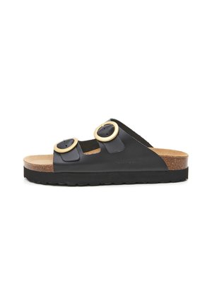 Sandales à glissière en cuir noir avec deux boucles rondes dorées, semelle en liège et semelle noire texturée. Design minimaliste et style ouvert. 