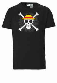 Black cotton t-shirt featuring a large white skull and crossbones graphic with a yellow hat, set against a dark background pattern.