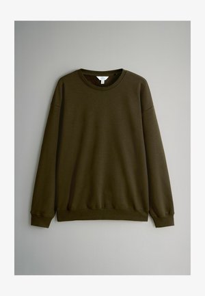 Mørkegrøn bomulds sweatshirt med rund hals, lange ærmer og ribbede manchetter og kant, der har en glat tekstur.