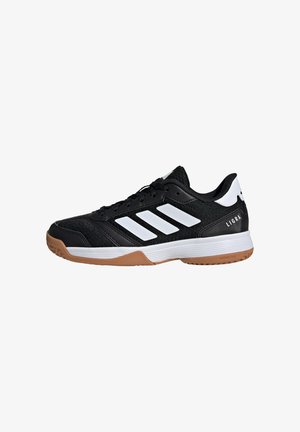 Black athletic shoe with white stripes and accents. Features a textured upper, padded collar, and gum rubber outsole. Model name "Ligra" on heel.