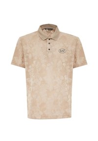 Polo beige con un motivo floreale testurizzato, chiusura a tre bottoni e logo ricamato EA7 sul petto. Maniche corte.