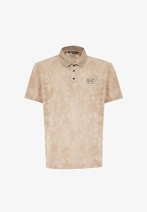 Polo beige con un motivo floreale testurizzato, chiusura a tre bottoni e logo ricamato EA7 sul petto. Maniche corte.