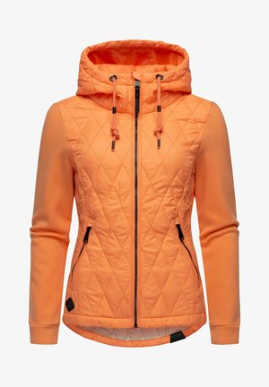 Veste matelassée orange avec capuche, dotée d'une fermeture éclair, de cordons de serrage, de poches latérales et de poignets côtelés. Tissu doux avec des coutures en diagonale.