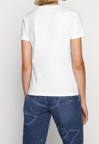 Emporio Armani Triko s potiskem - white