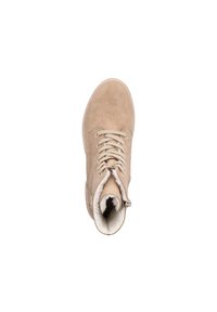 Light beige suede ankle boot with laces, interior lined with white fur, side zipper detail, flat rubber sole, and rounded toe.