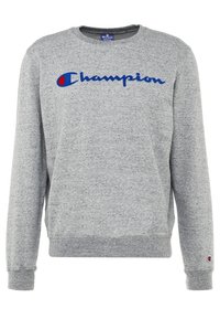 Felpa grigia realizzata in tessuto misto cotone. Presenta un logo "Champion" blu sulla parte anteriore, polsini e orlo a coste. Collo tondo classico.