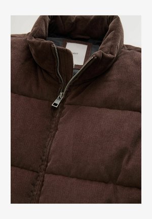 Brown corduroy puffer jacket with a high collar, zip closure, and quilted texture, featuring a neutral lining and brand label.