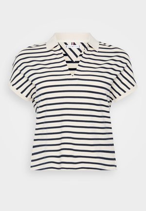 Csíkos rövid ujjú pólóing V-kivágással, tengerészkék és krém színű csíkokkal, puha pamut anyagból, klasszikus gallér kialakítással.