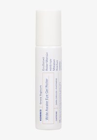 Kula żelowa Korres Wide Awake Eye Gel Roller z kofeiną, greckim jogurtem oraz instrukcją stosowania w walce z cieniami pod oczami i opuchlizną, biały cylindryczny pojemnik.