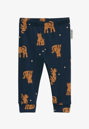 Granatowe legginsy z wesołym nadrukiem pomarańczowego kota w różnych pozach oraz białymi kropkami, wykonane z miękkiej, elastycznej bawełny.