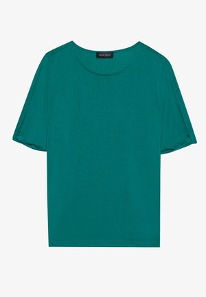 Haut teal à manches courtes en tissu léger. Présente un col rond et une coupe légèrement oversize avec des manches retroussées.