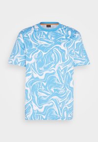 Light blue t-shirt featuring a swirled white pattern, short sleeves, and a crew neckline with a contrasting orange label detail.