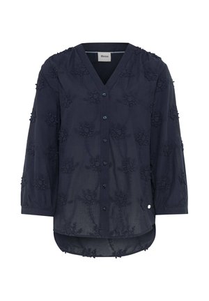 Marineblaue transparente Bluse mit floralem Stickmuster, V-Ausschnitt, durchgehender Knopfleiste vorne, Dreiviertelärmeln und abgerundetem Saum, hinten länger.