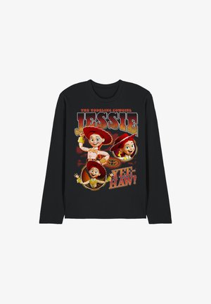 Black long-sleeve shirt with three animated Jessie cowgirl poses, text "The Yodeling Cowgirl Jessie" and "Yee-Haw!" in bold red and yellow letters.