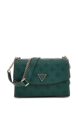 Sac bandoulière Guess vert foncé avec motifs de logo en relief, bandoulière chaîne dorée et logo métallique triangulaire sur le rabat avant.