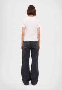 MOSCHINO JEANS LOGOS - T-shirt - bas - fantasia bianco