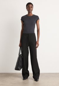 BOSS TILDINA - Tygbyxor - black