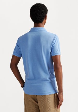 THE ICONIC MESH POLO SHIRT
 - Bluză polo - bristol blue