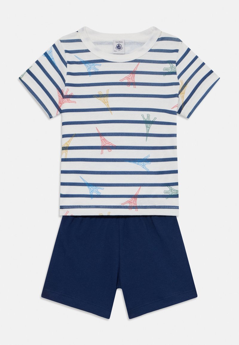 Pasiasty bawełniany T-shirt z wzorem wieży Eiffla w różnych kolorach, w połączeniu z granatowymi szortami. Miękka tkanina i wygodny krój.