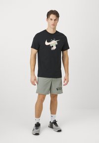 Nike Performance TEE SLUB - Camiseta deportiva - black