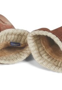 Brune semskede votter med en strikket beige ullfor, med et merke som leser "HOWARD LONDON" inni. Myk tekstur og brede mansjetter.