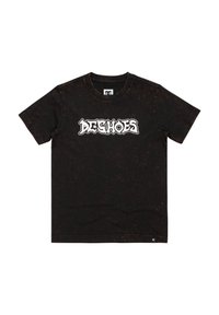 Černé tričko s texturálním povrchem, na přední straně s výrazným bílým grafickým logem "DC Shoes". Krátké rukávy a kulatý výstřih.