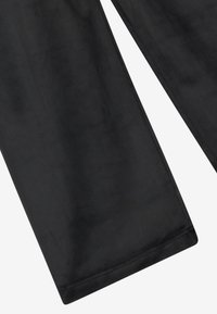 Black fabric trousers with a smooth texture, straight-leg design, and hemmed edges, showcasing a minimalist style without patterns or embellishments.