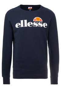 Sudadera azul marino, cuello redondo, mangas largas. Presenta un gran logo blanco de "ellesse" con un detalle de medio sol colorido encima. Material de mezcla de algodón.